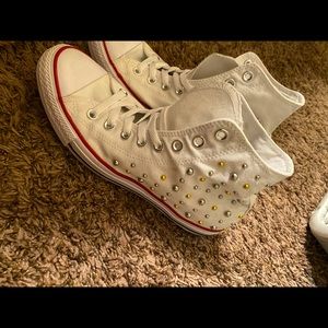White high top converse with rhinestones.